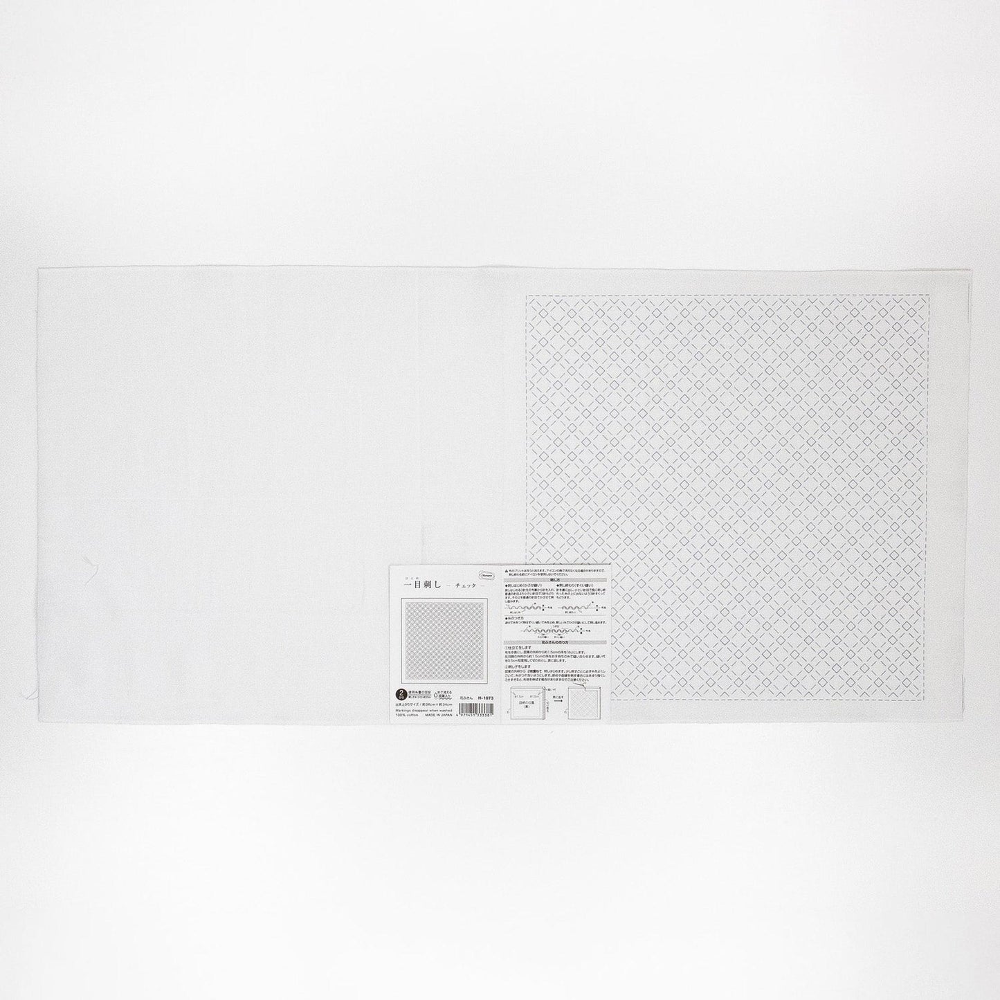 The image is a plain white sheet of paper with a grid pattern on it.
