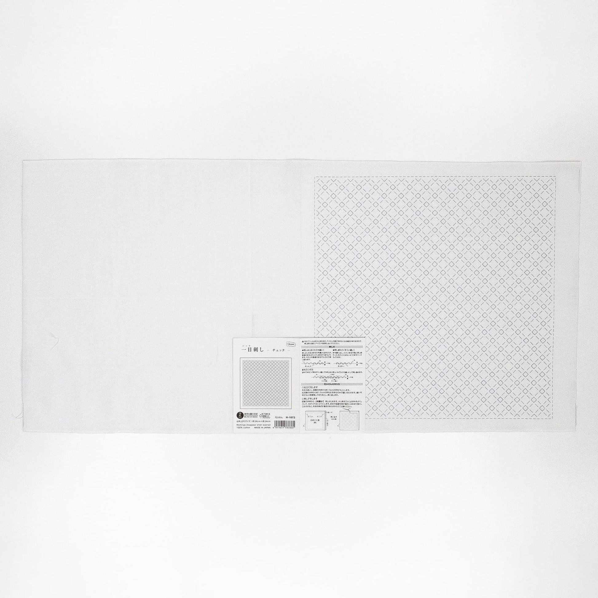 The image is a plain white sheet of paper with a grid pattern on it.