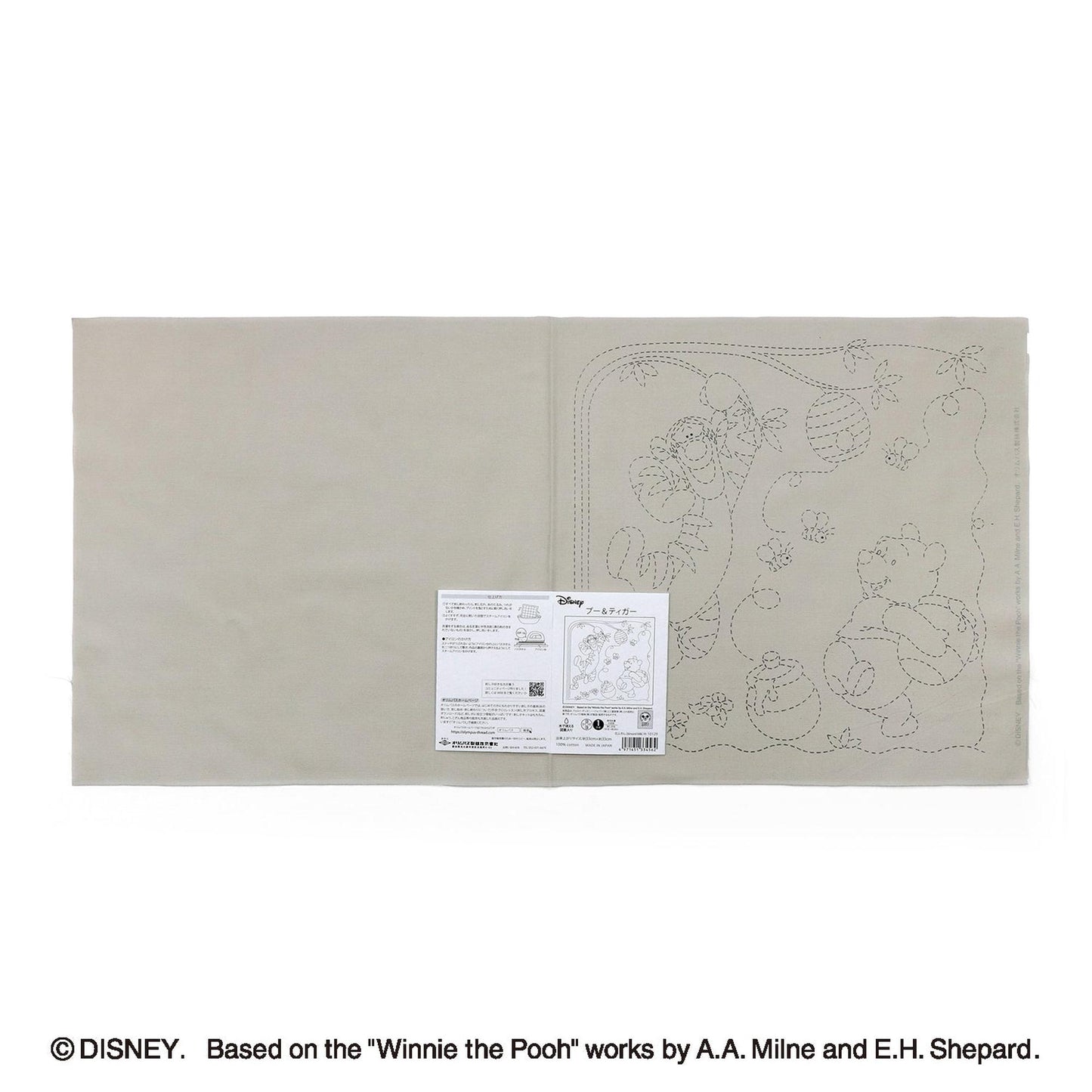 The image is a page from a book or magazine featuring a page with a drawing of Winnie the Pooh and a label with text.