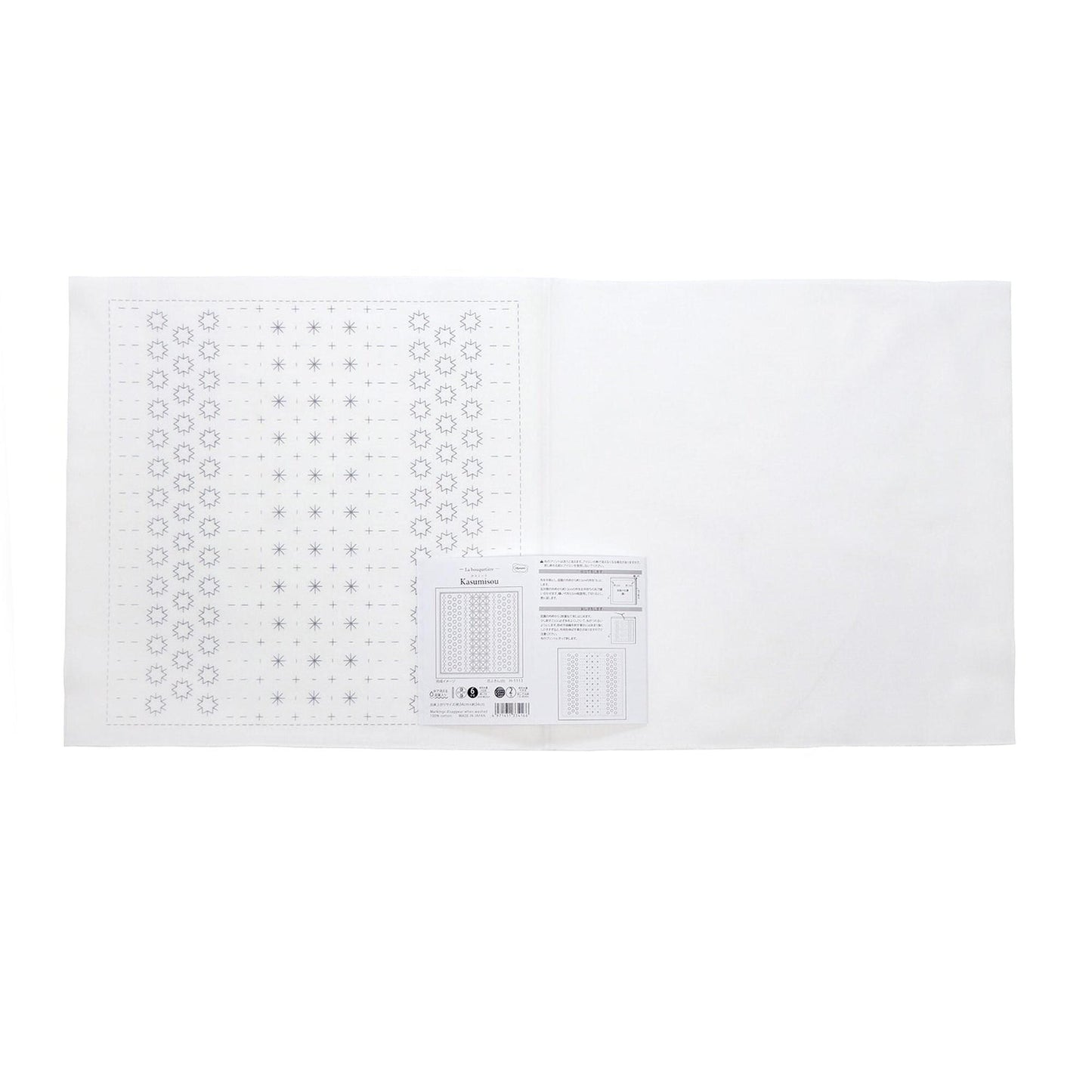 The image is a white sheet of paper with a grid of small black dots arranged in a pattern.