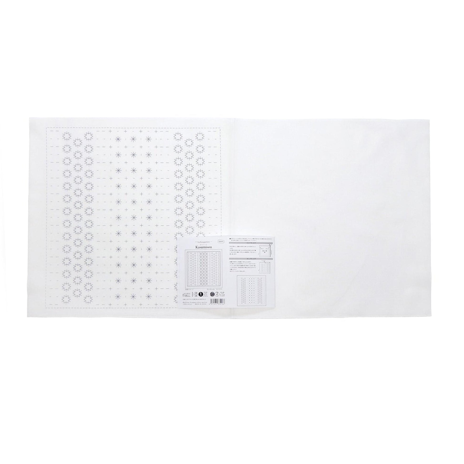 The image is a white sheet of paper with a grid of small black dots arranged in a pattern.