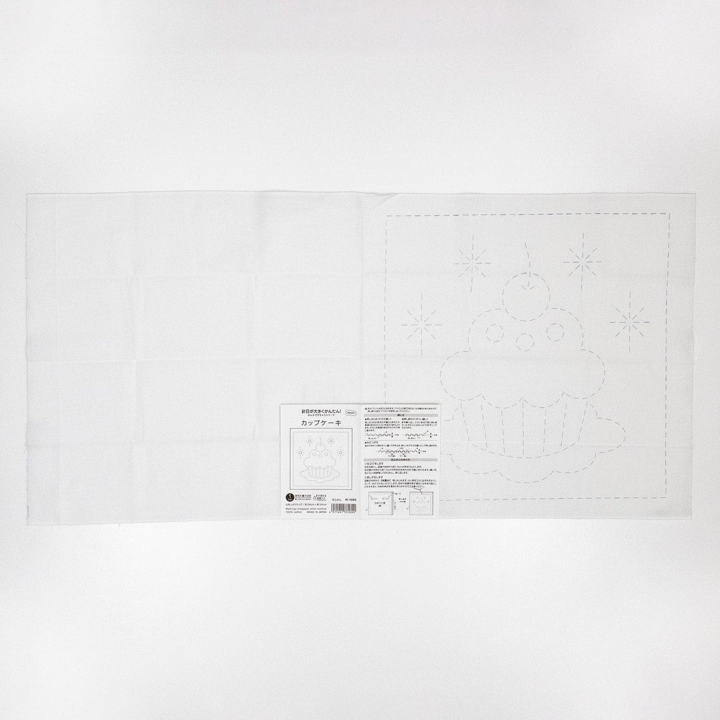 The image is a printed sheet of paper with a drawing of a cupcake on it, along with some text and instructions.