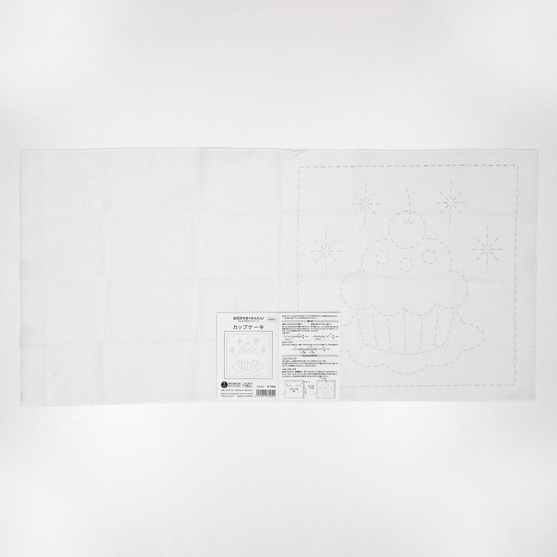 The image is a printed sheet of paper with a drawing of a cupcake on it, along with some text and instructions.
