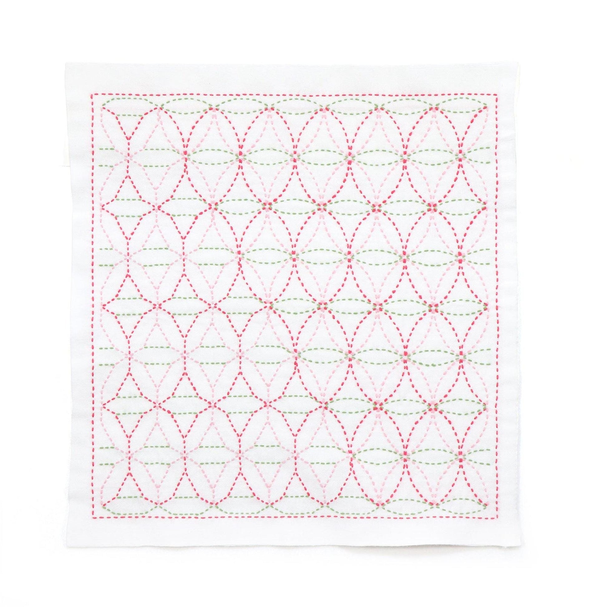 a square-shaped piece of fabric with a repeating pattern of red and green circles and lines, creating a visually striking and intricate design.