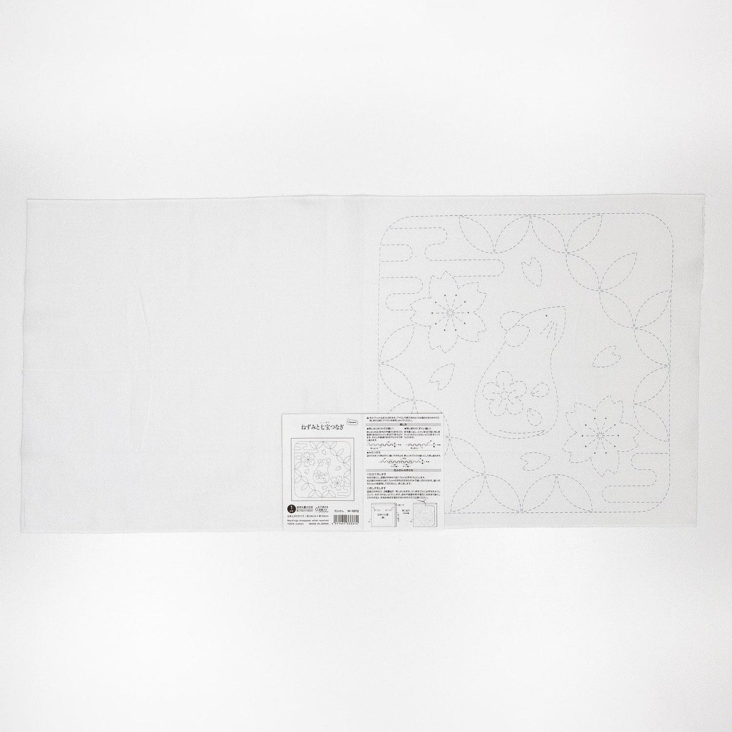 The image is a plain white sheet of paper with a black and white design featuring a floral pattern.
