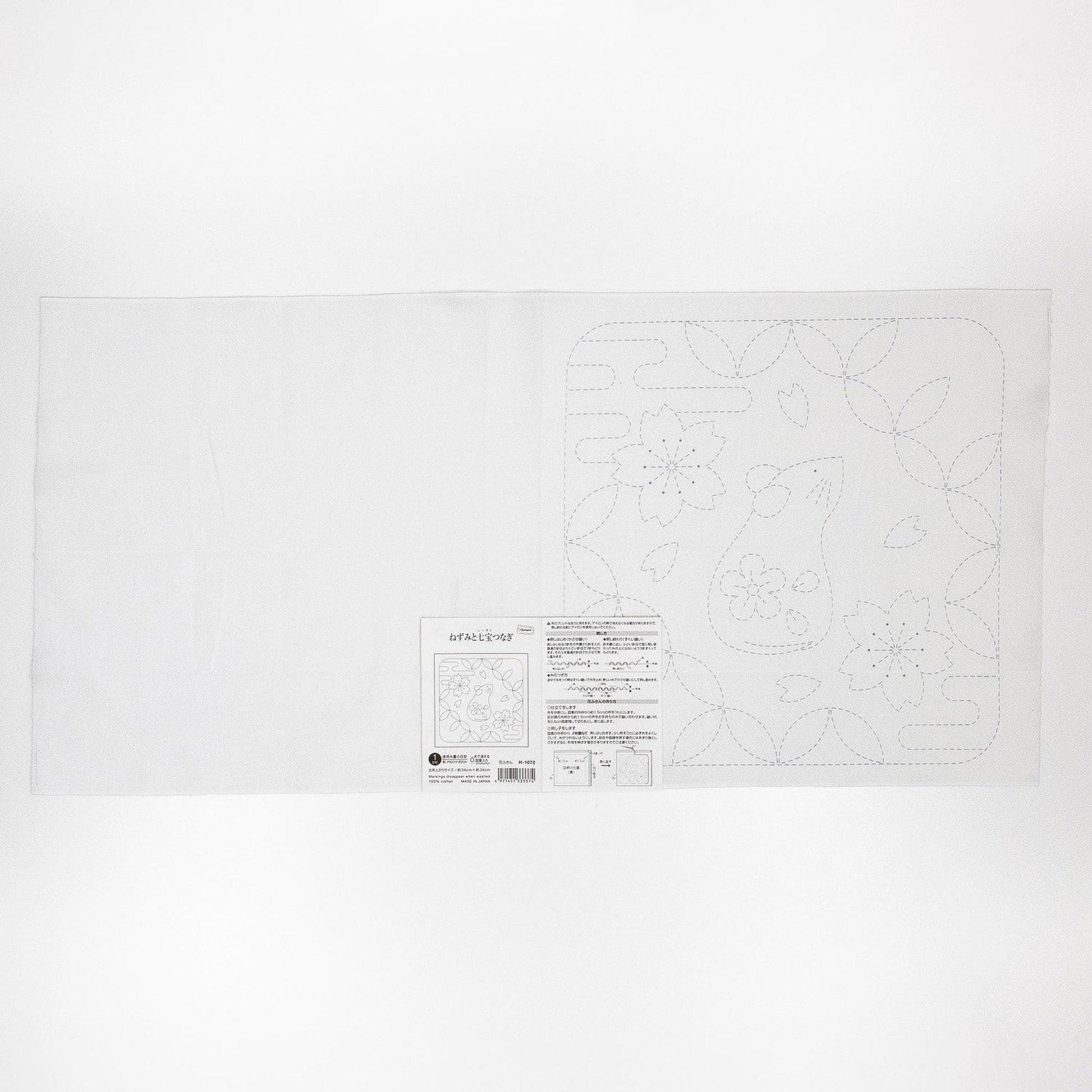 The image is a plain white sheet of paper with a black and white design featuring a floral pattern.