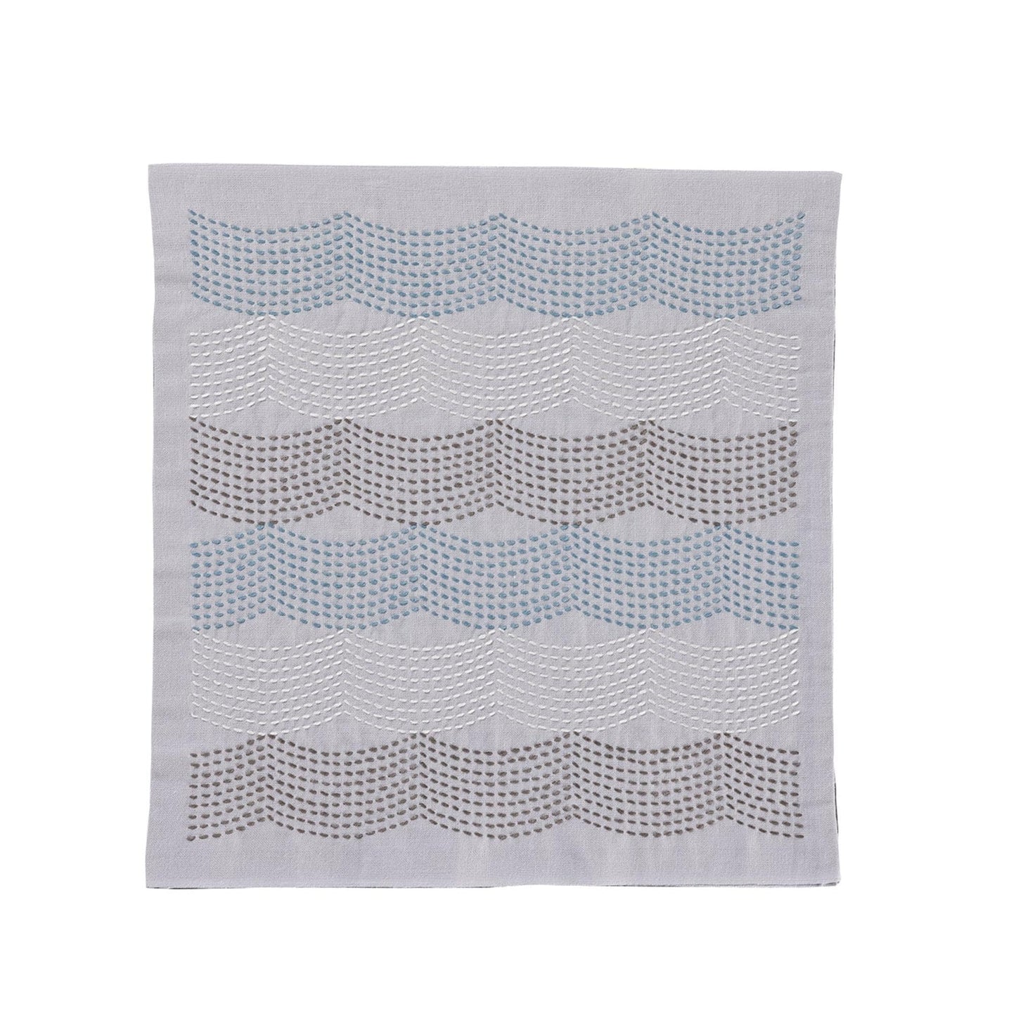 a gray fabric with a wavy pattern of small circles or dots arranged in a repeating diagonal line across the fabric.