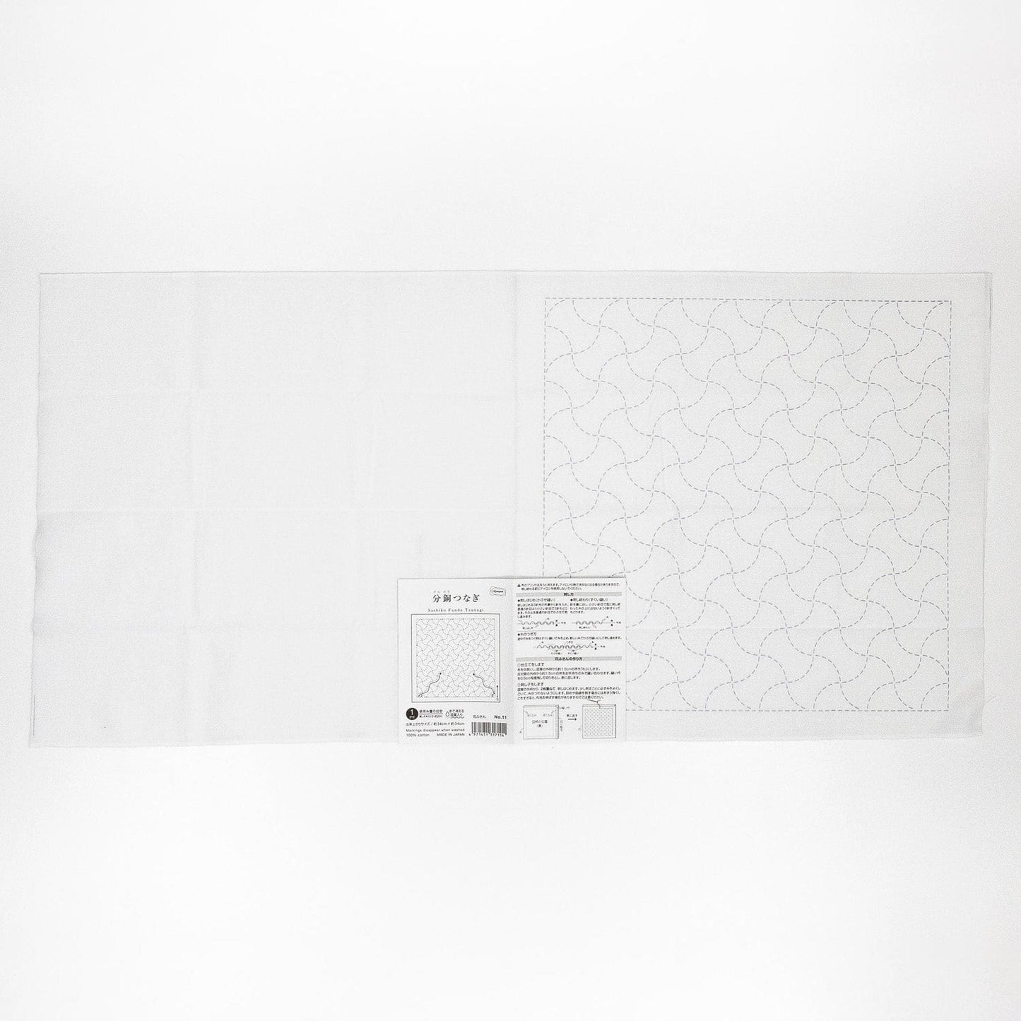 The image is a white square with a black and white pattern on it.