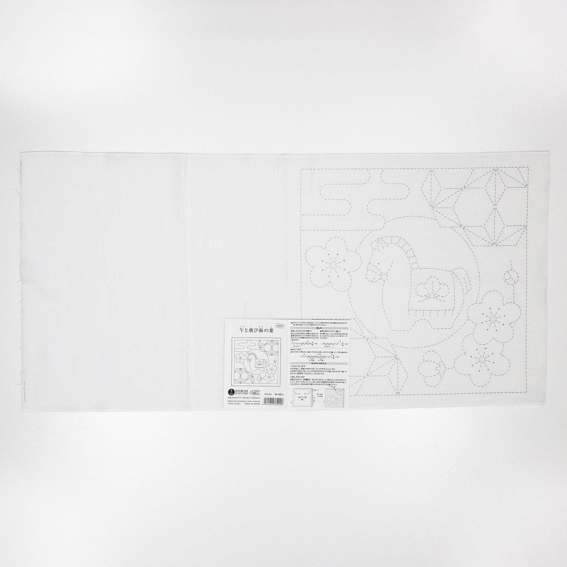 The image is a white piece of paper with a black and white illustration of a horse and flowers.