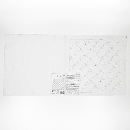 The image is a plain white sheet of paper with a printed pattern or design on it.