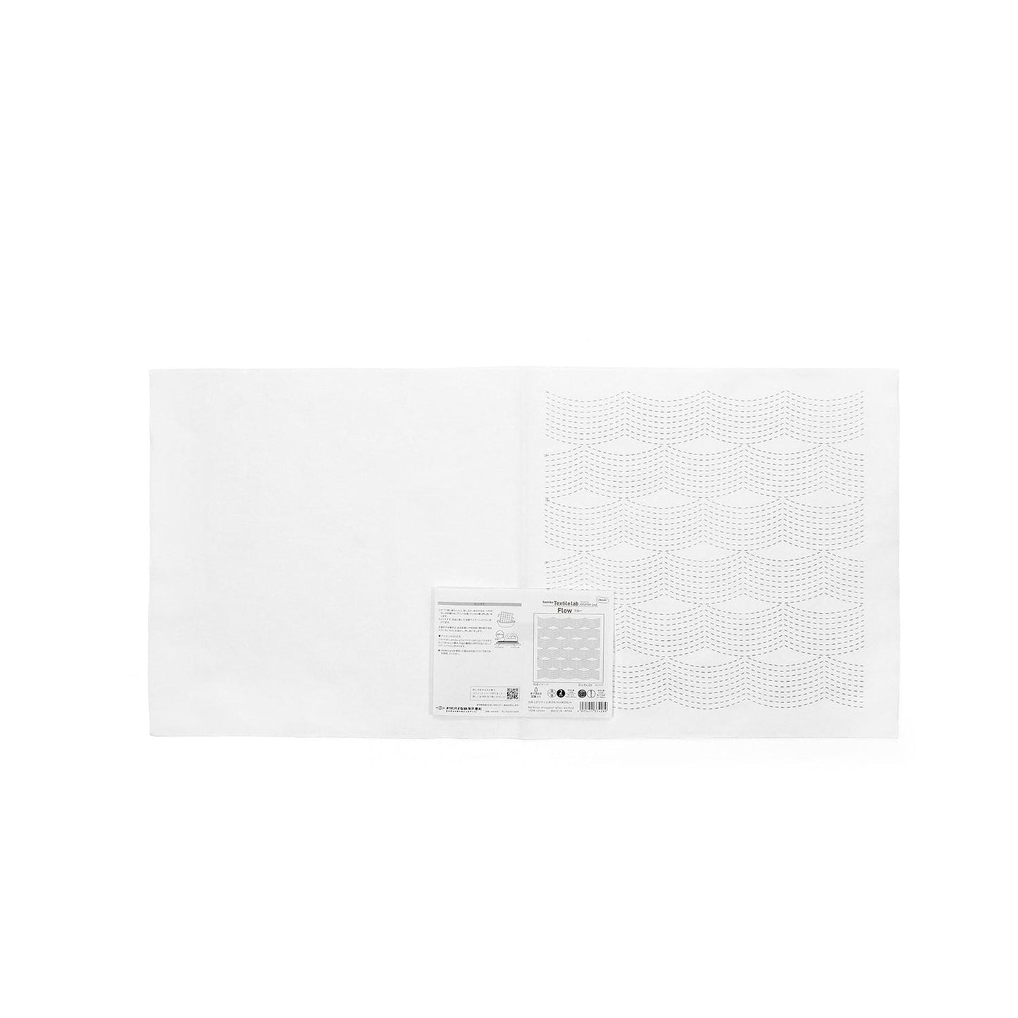 The image is a plain white sheet of paper with a label or text on it.