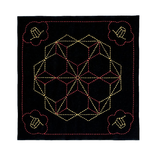 a square with a geometric pattern of yellow and red lines and shapes, including a flower-like design on the left side.