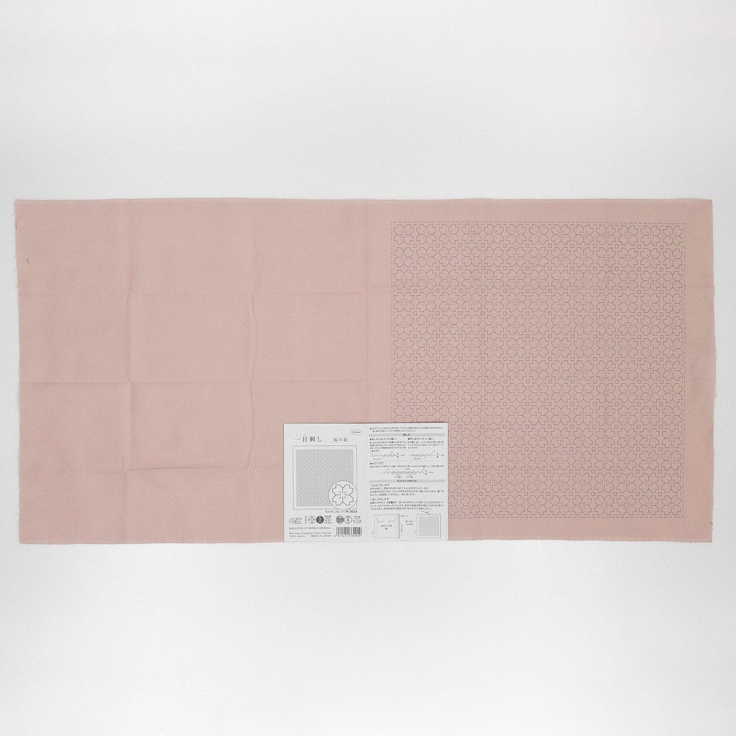 The image is a single, large pink fabric with a printed pattern on it.