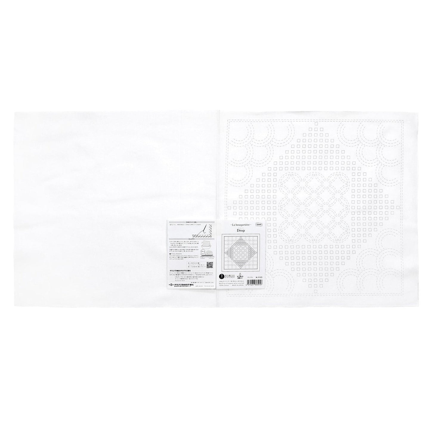 The image is a white square with a black and white pattern on it.