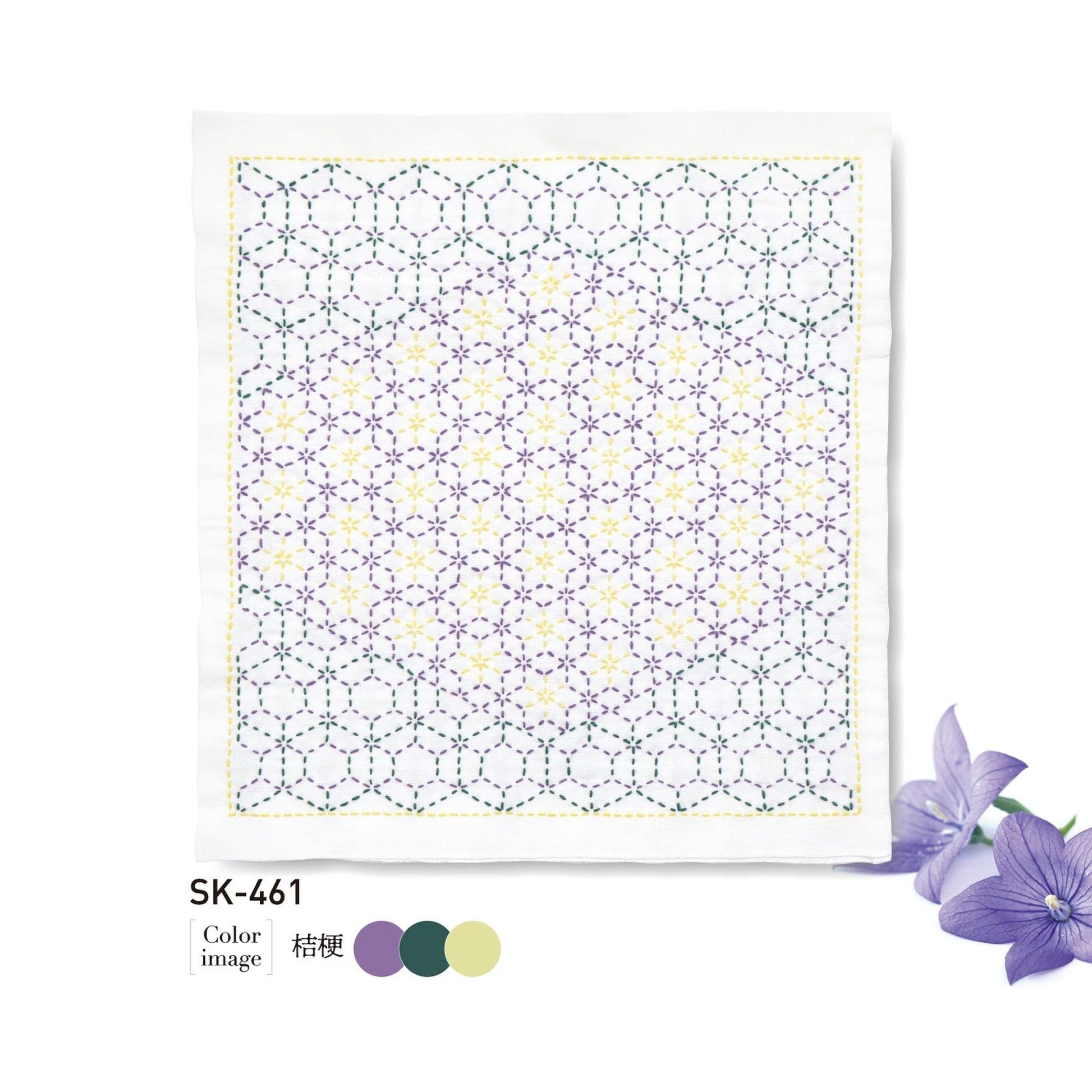 The image is a square with a geometric pattern of purple and yellow hexagons, and there are purple flowers next to it.