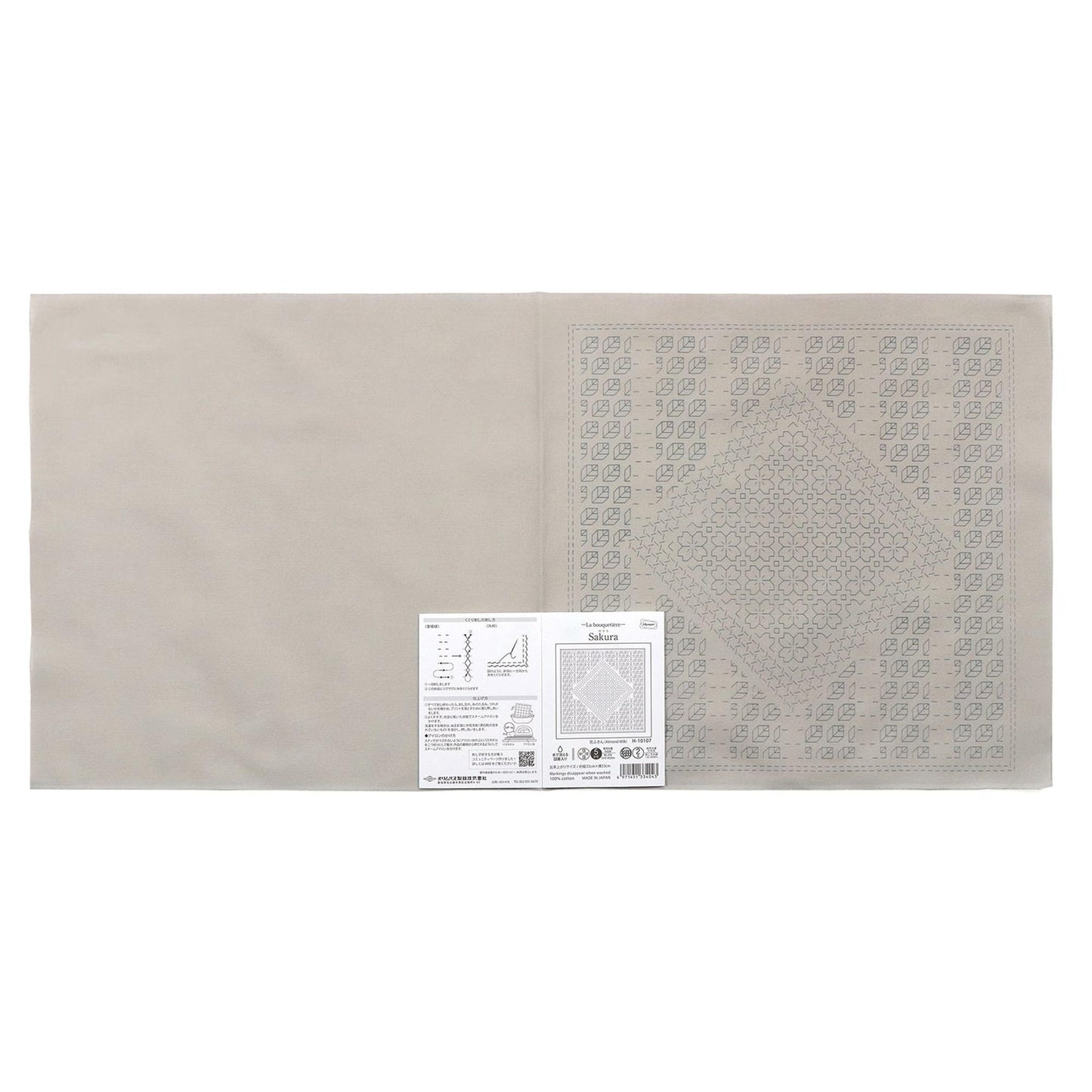 The image is a plain white background with a printed label or instruction sheet placed on the right side.