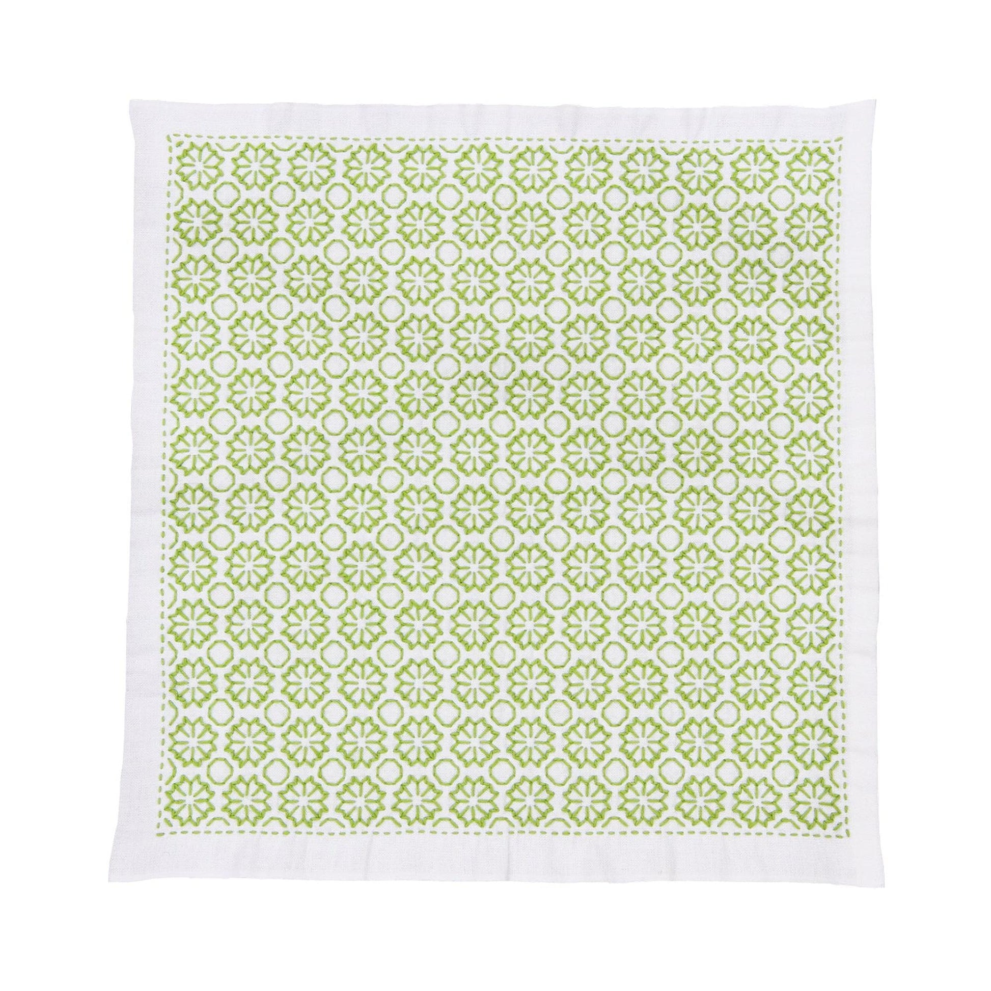 a square-shaped fabric with a repeating pattern of green flowers on a white background.