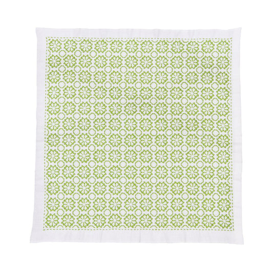 a square-shaped fabric with a repeating pattern of green flowers on a white background.