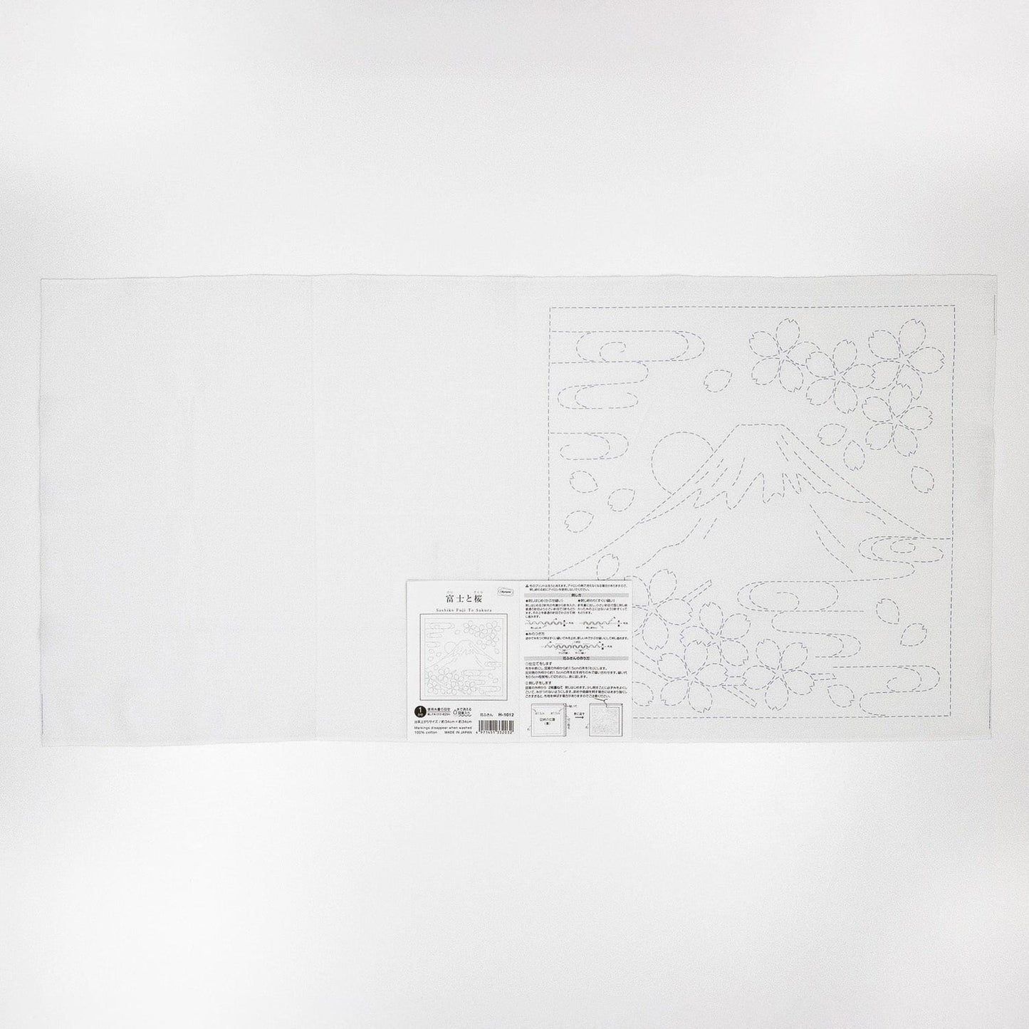 The image is a white sheet of paper with a black and white illustration of a mountain and flowers.
