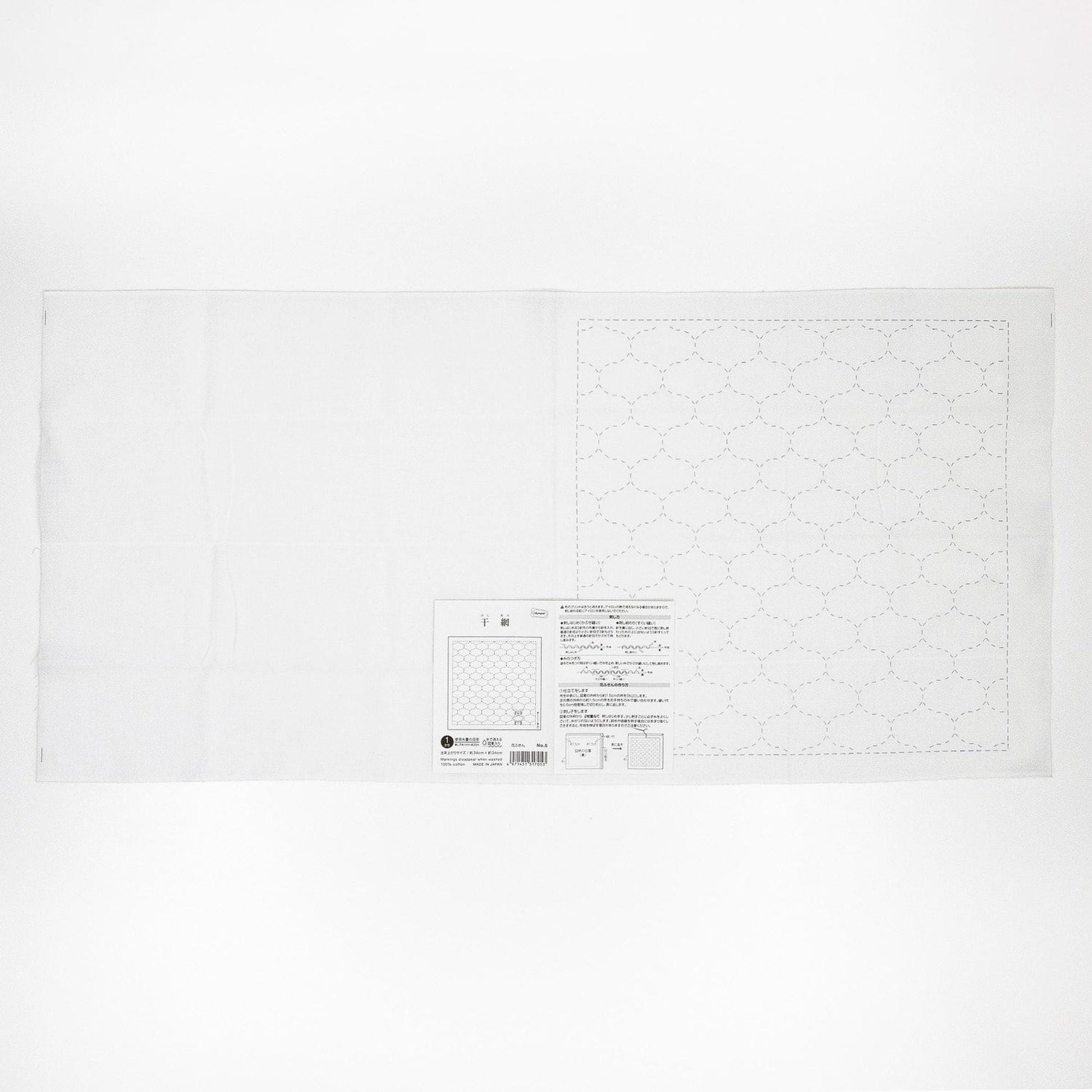 The image is a plain white sheet of paper with a grid pattern on it.
