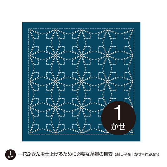 A square with a repeating pattern of white diamond shapes against a dark blue background.