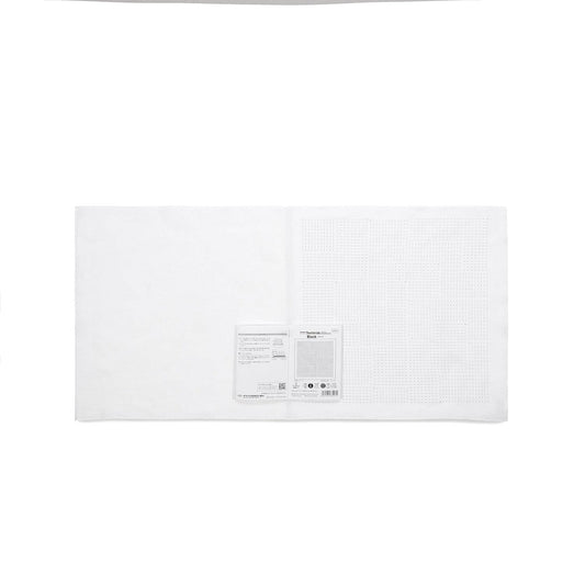 The image is a plain white sheet of paper or fabric with a small label or tag attached to it.