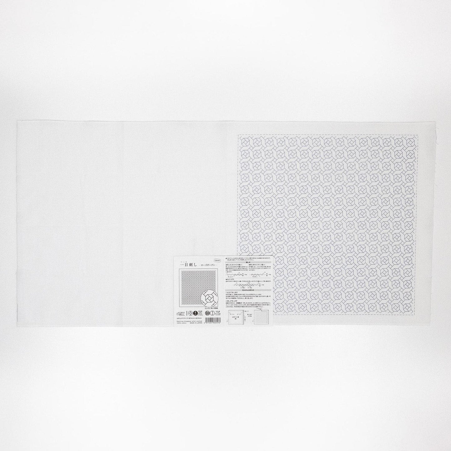 The image is a white sheet of paper with a patterned square on it.