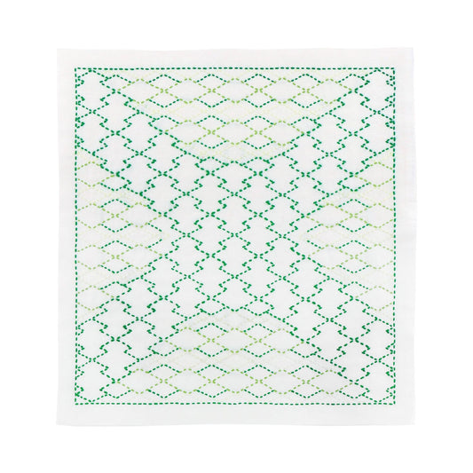 a repeating pattern of green and white diamond shapes, creating a visually striking and intricate design.