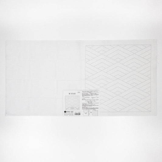 The image is a plain white sheet of paper with a geometric pattern on it.