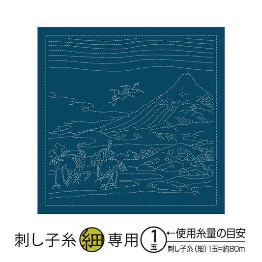 The image is a blue square with a white border, depicting a landscape with mountains, trees, and a bird. The image is a Japanese embroidery design.