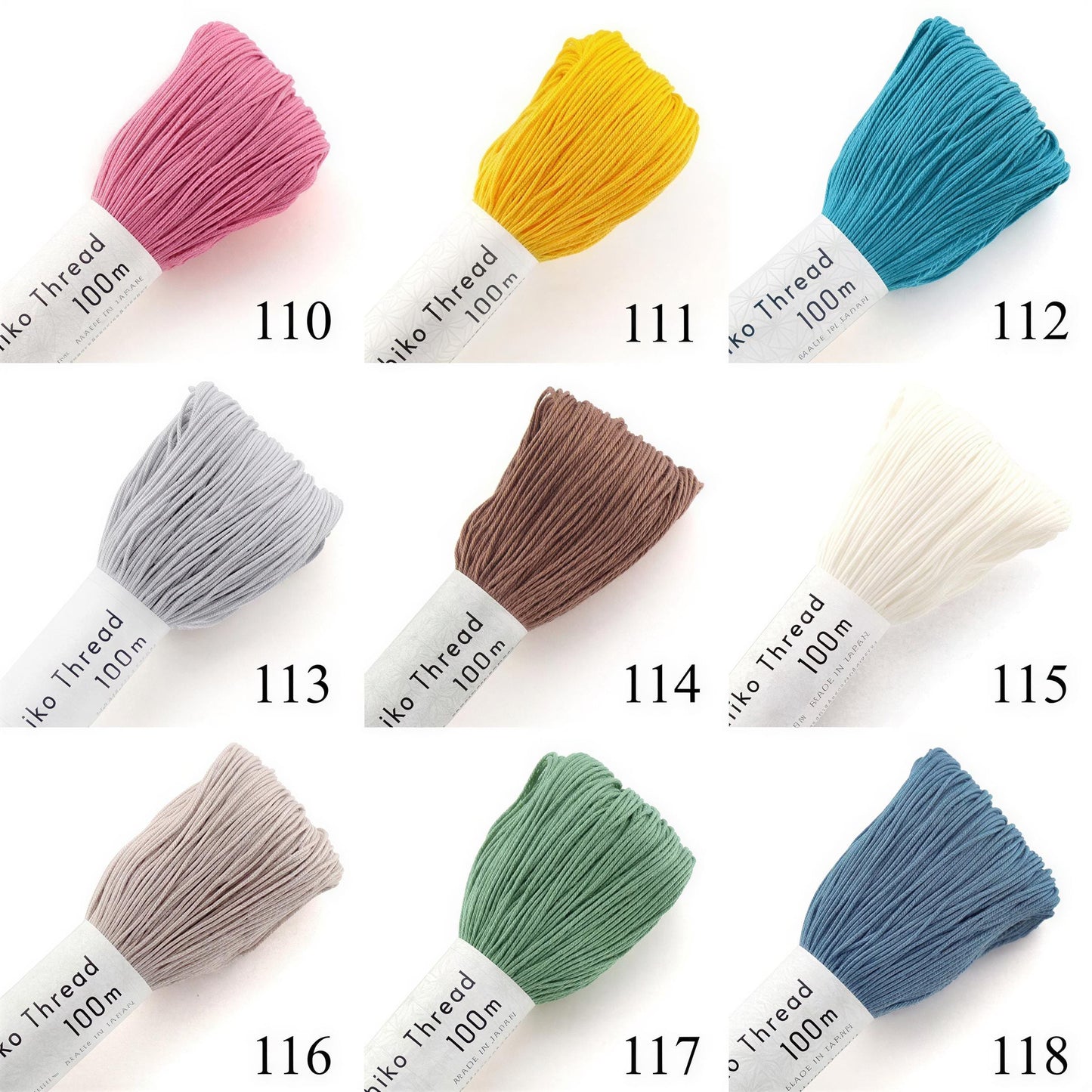 nine spools of thread in various colors, each labeled with a number.