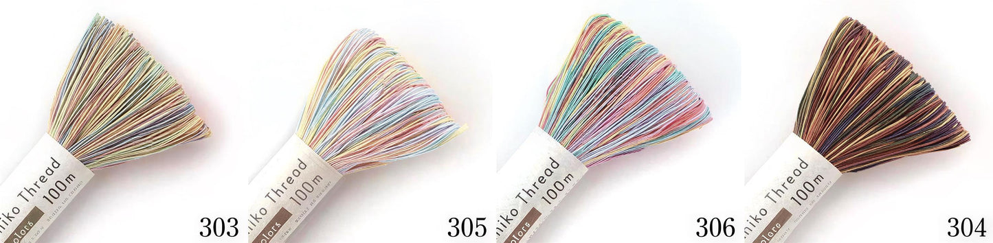 four bundles of thread with different colors, each labeled with a number.