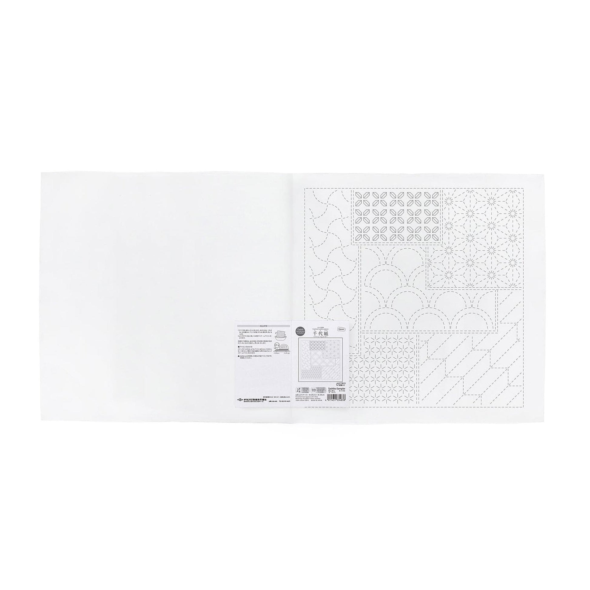 The image is a white square with a black and white pattern on it.