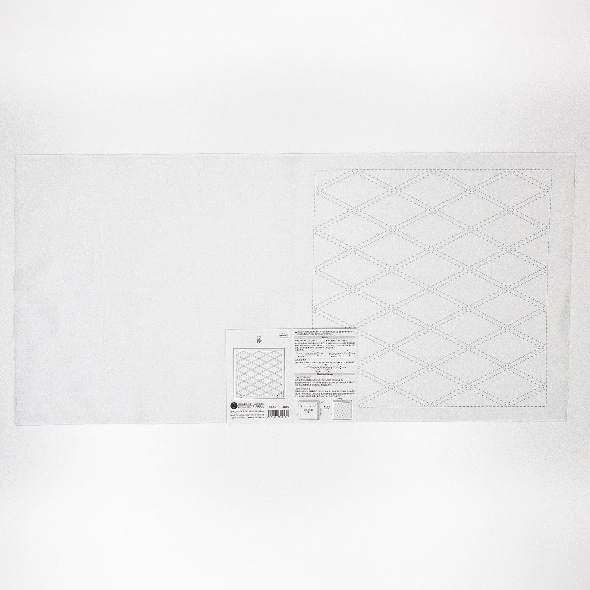 The image is a plain white sheet of paper with a grid pattern on it.