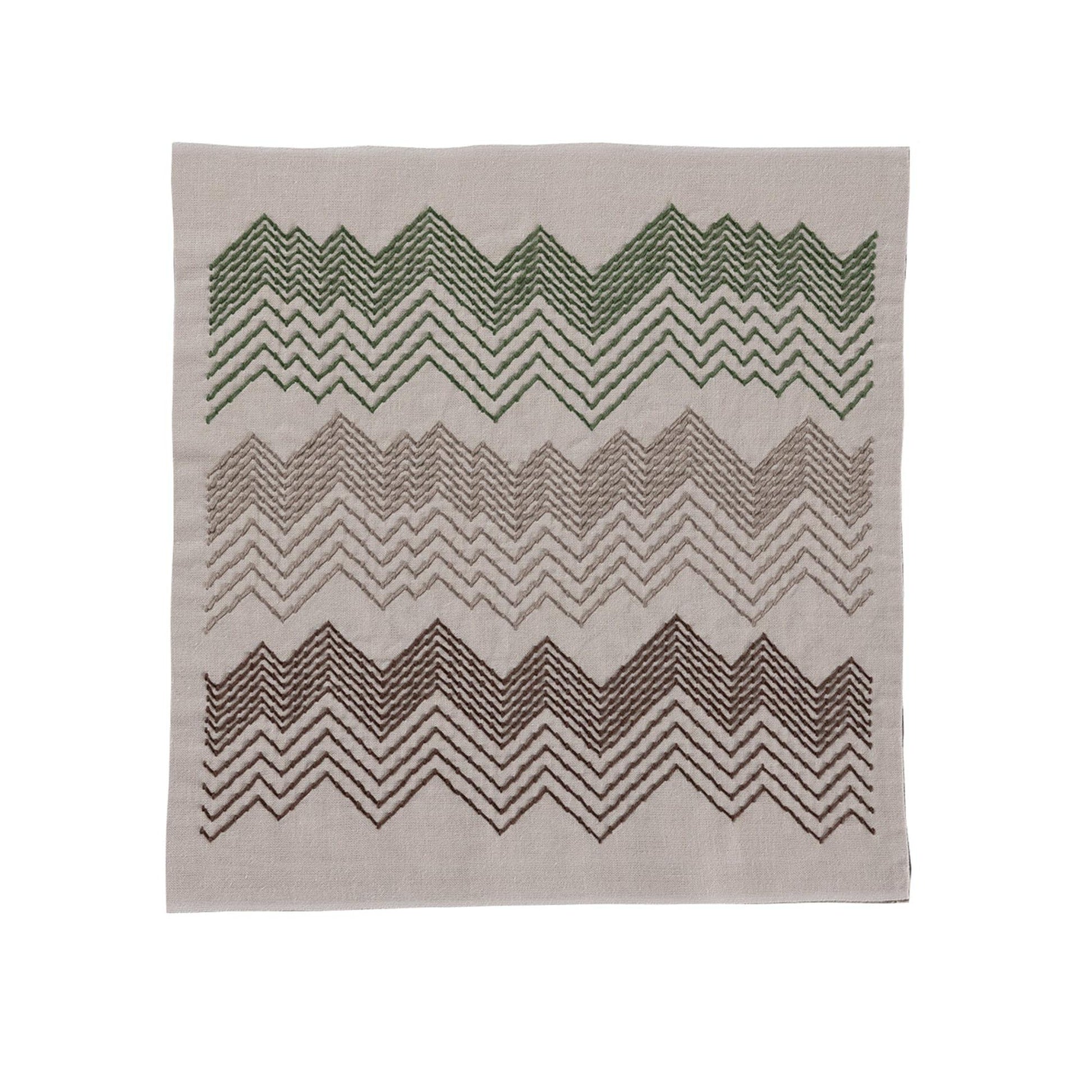 a square with a repeating pattern of green and brown zigzag lines.