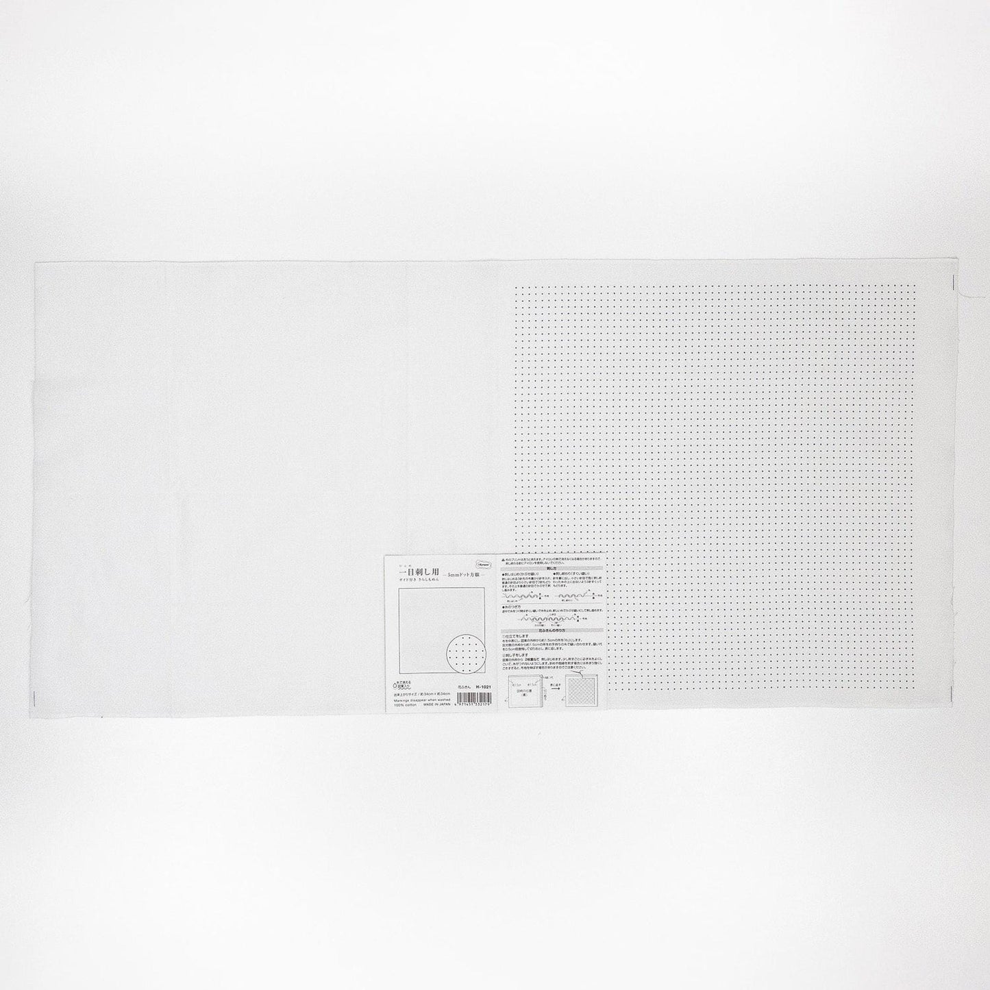 The image is a plain white sheet of paper with a small label or text on it.