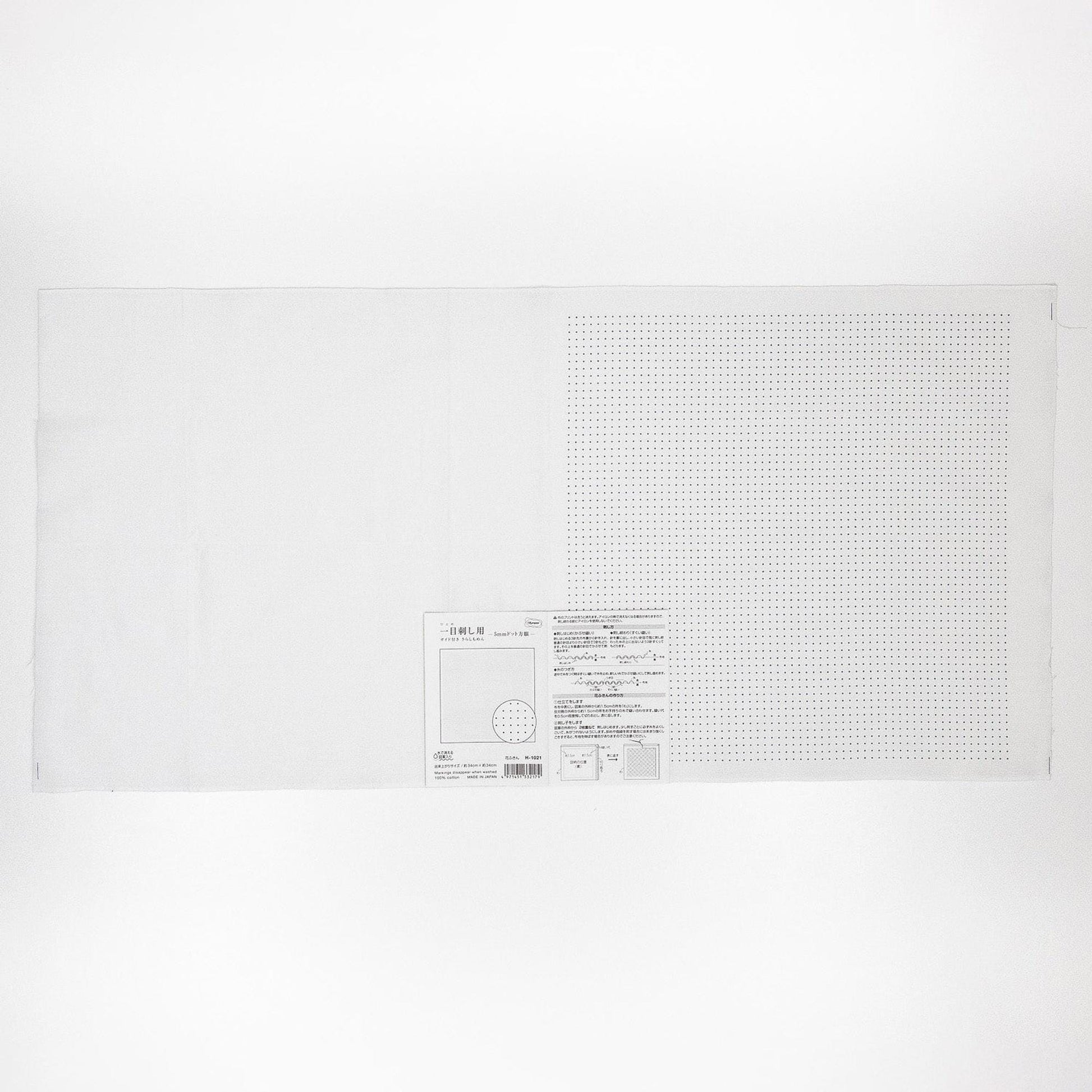 The image is a plain white sheet of paper with a small label or text on it.