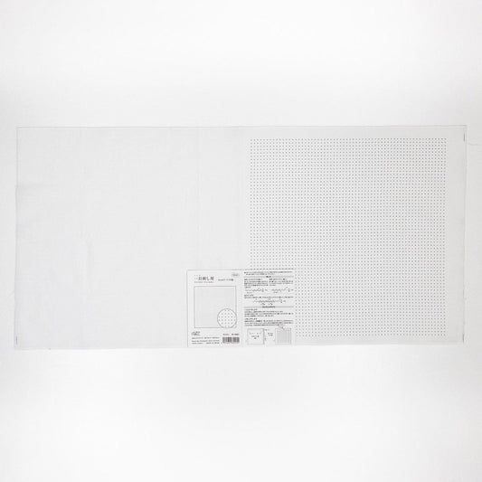 The image is a plain white sheet of paper with a small label or text on it.