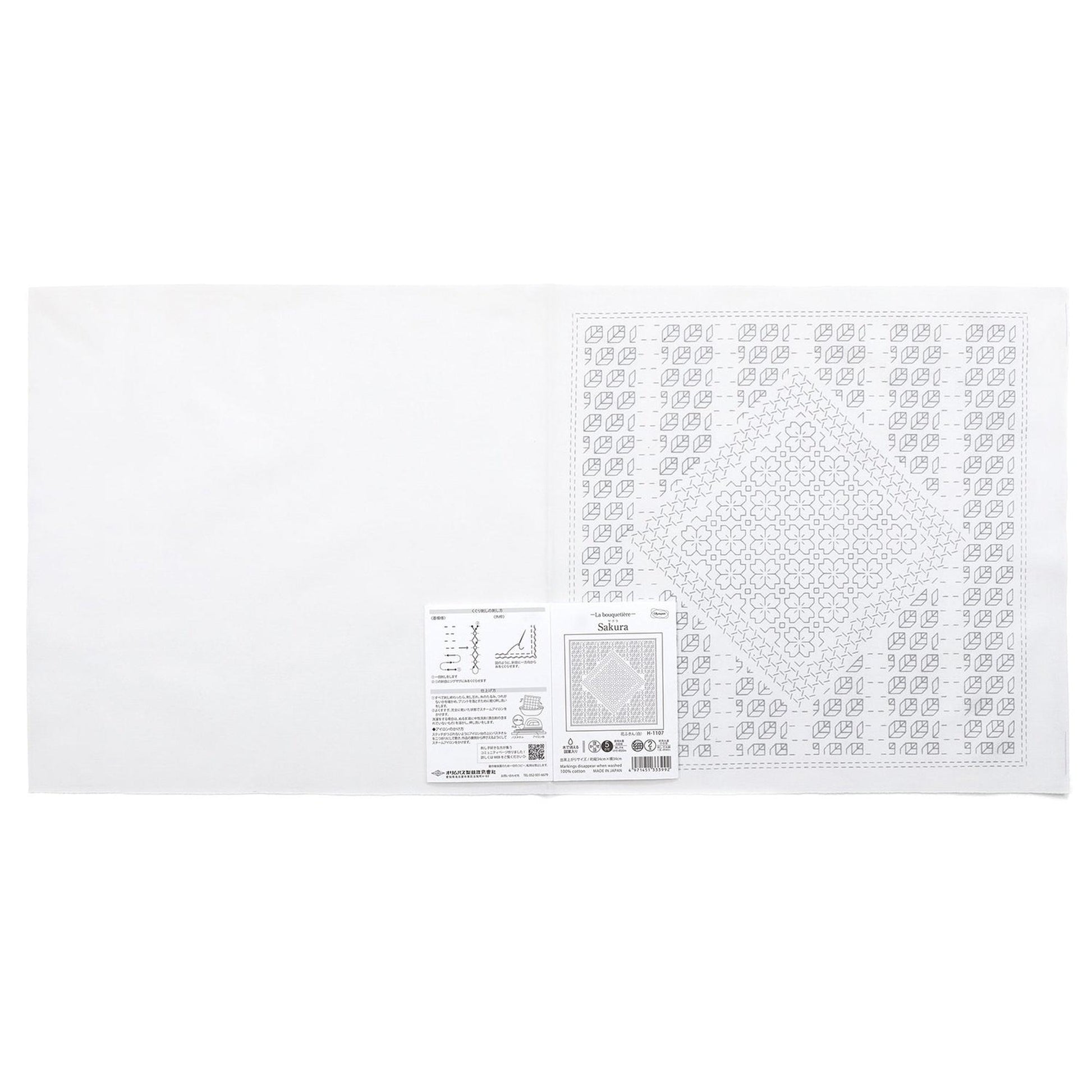 The image is a white square with a diamond-shaped pattern on it.