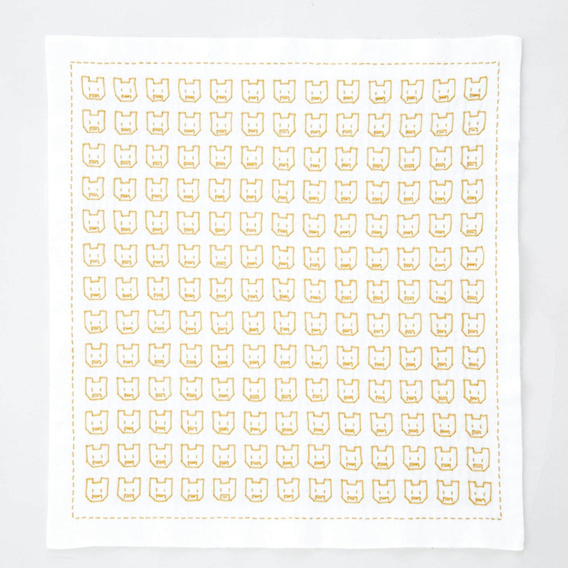 The image is a square with a repeating pattern of yellow and white shapes, resembling a grid or a design.