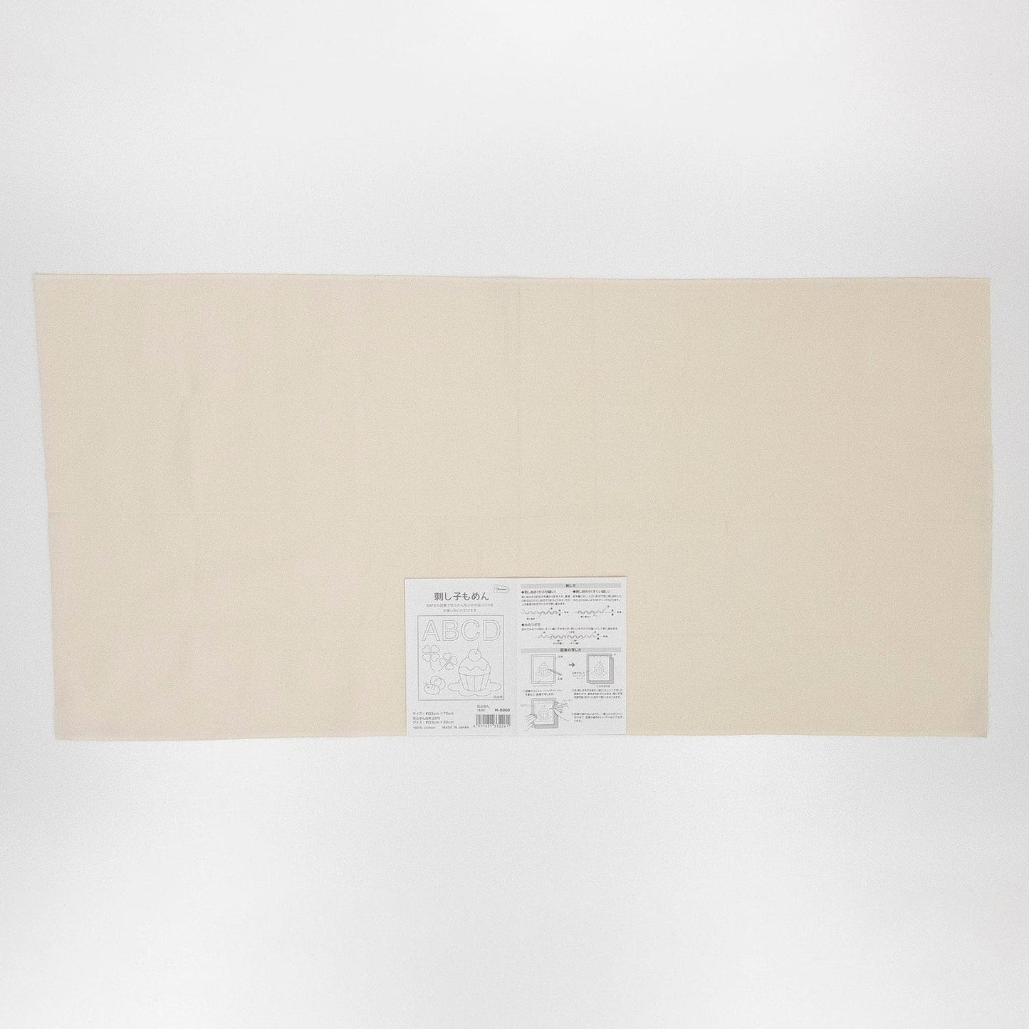 The image is a plain, cream-colored sheet of paper or card with some text and a small illustration on it.