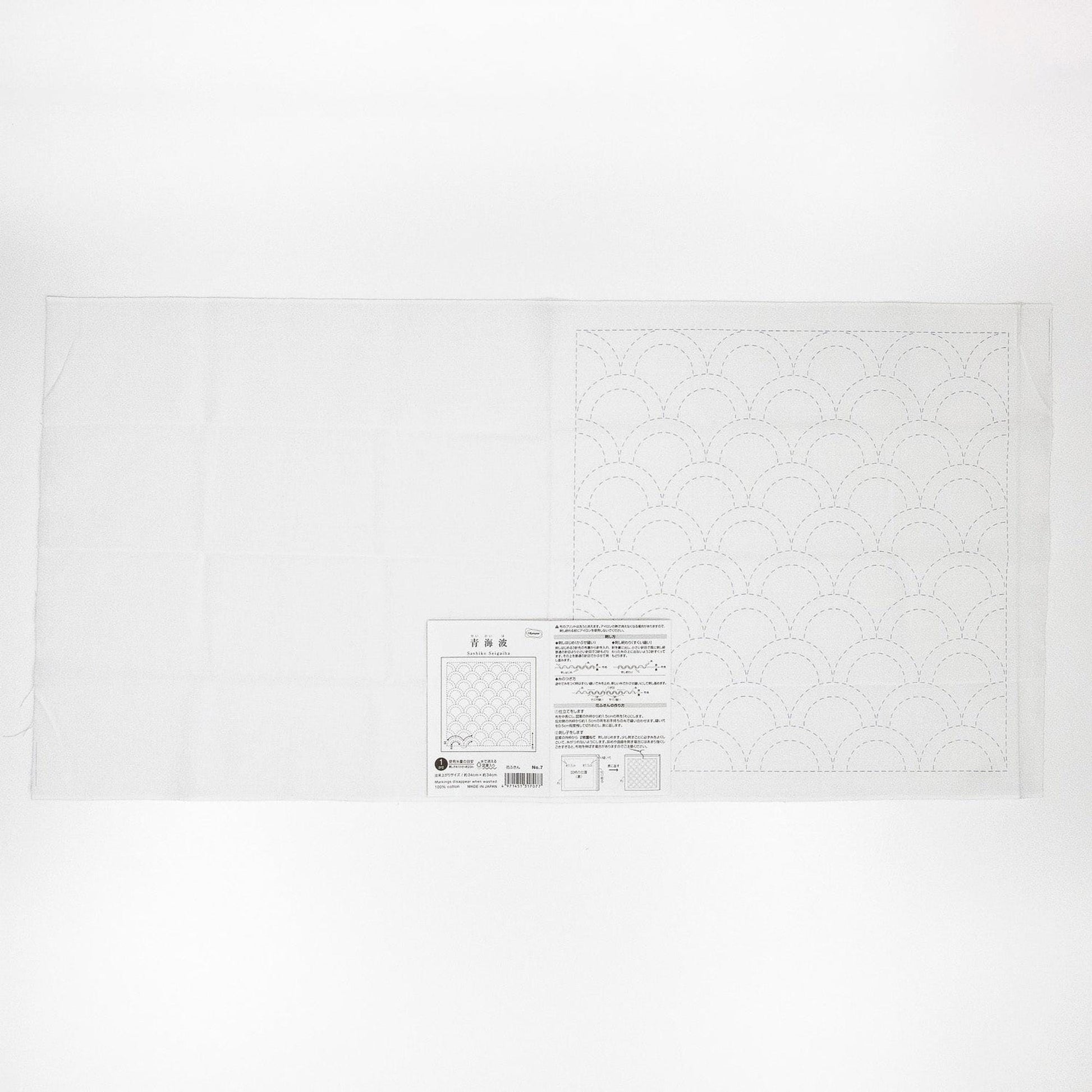 The image is a plain white sheet of paper with a pattern or design on it.