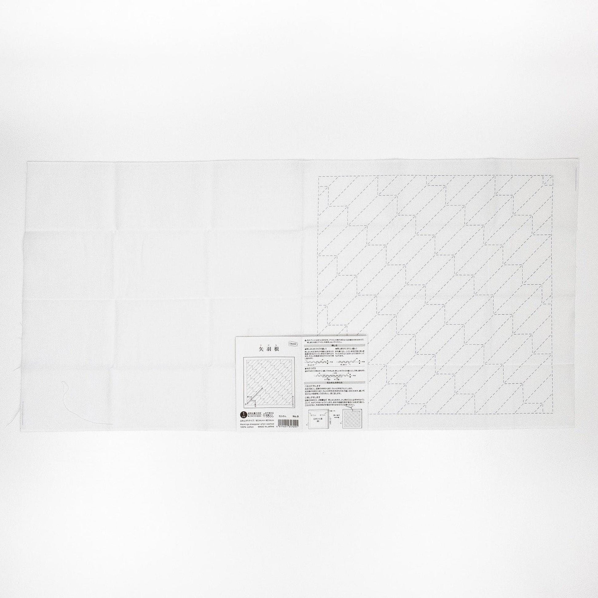 The image is a printed page with a grid of squares and a diagram, along with some text and a barcode.