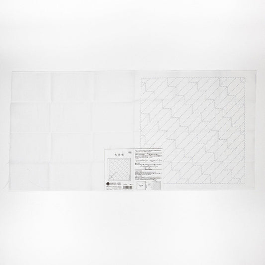 The image is a printed page with a grid of squares and a diagram, along with some text and a barcode.