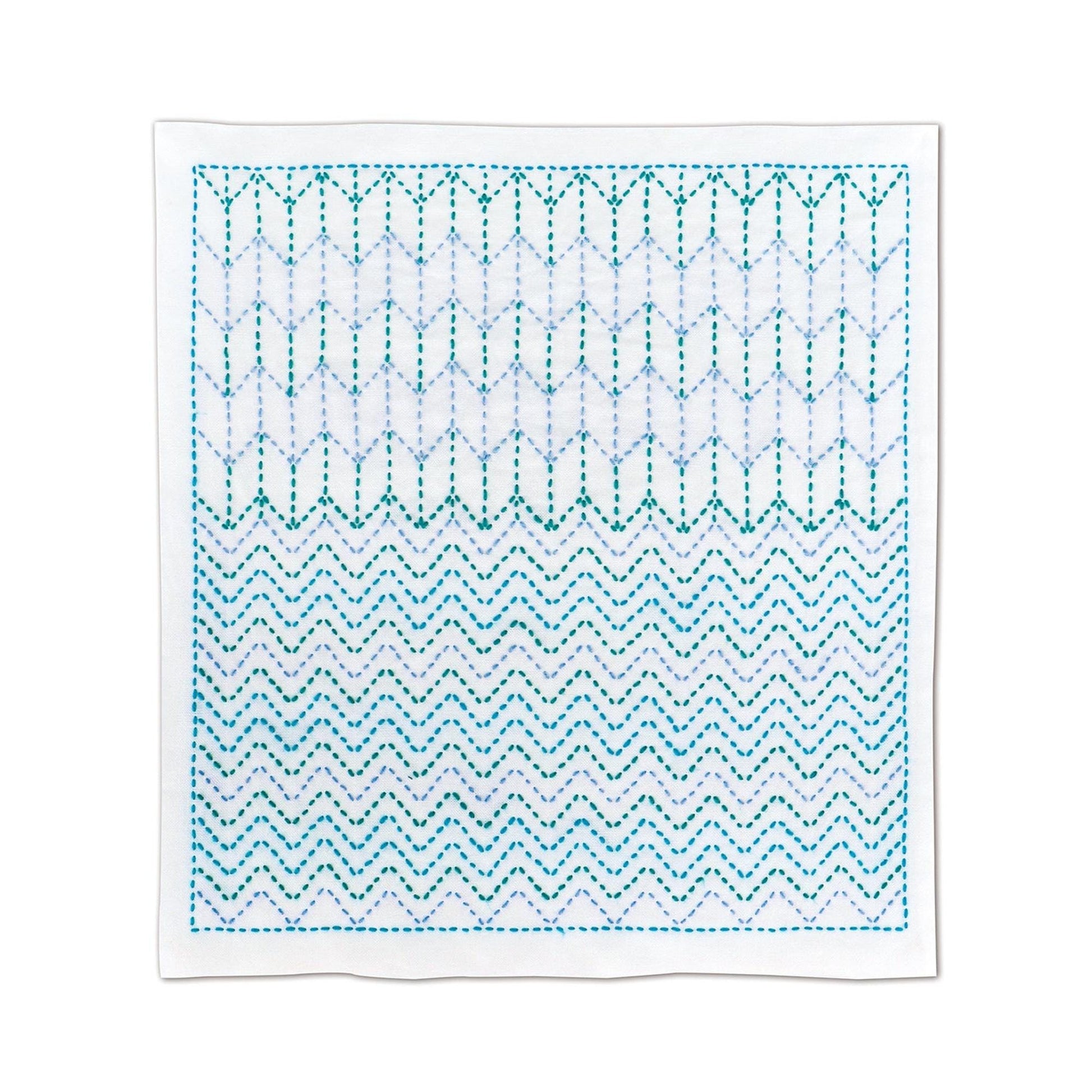 a square with a repeating pattern of zigzag lines in shades of blue and white.