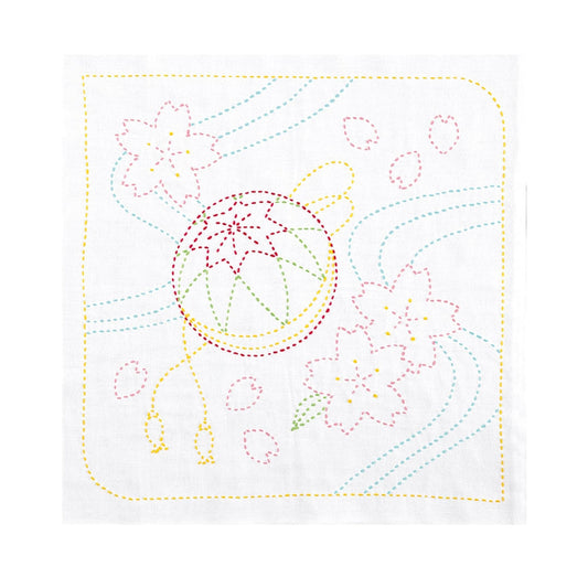 The image is a colorful embroidery design featuring various flowers and shapes, including a large flower in the center and smaller flowers surrounding it.