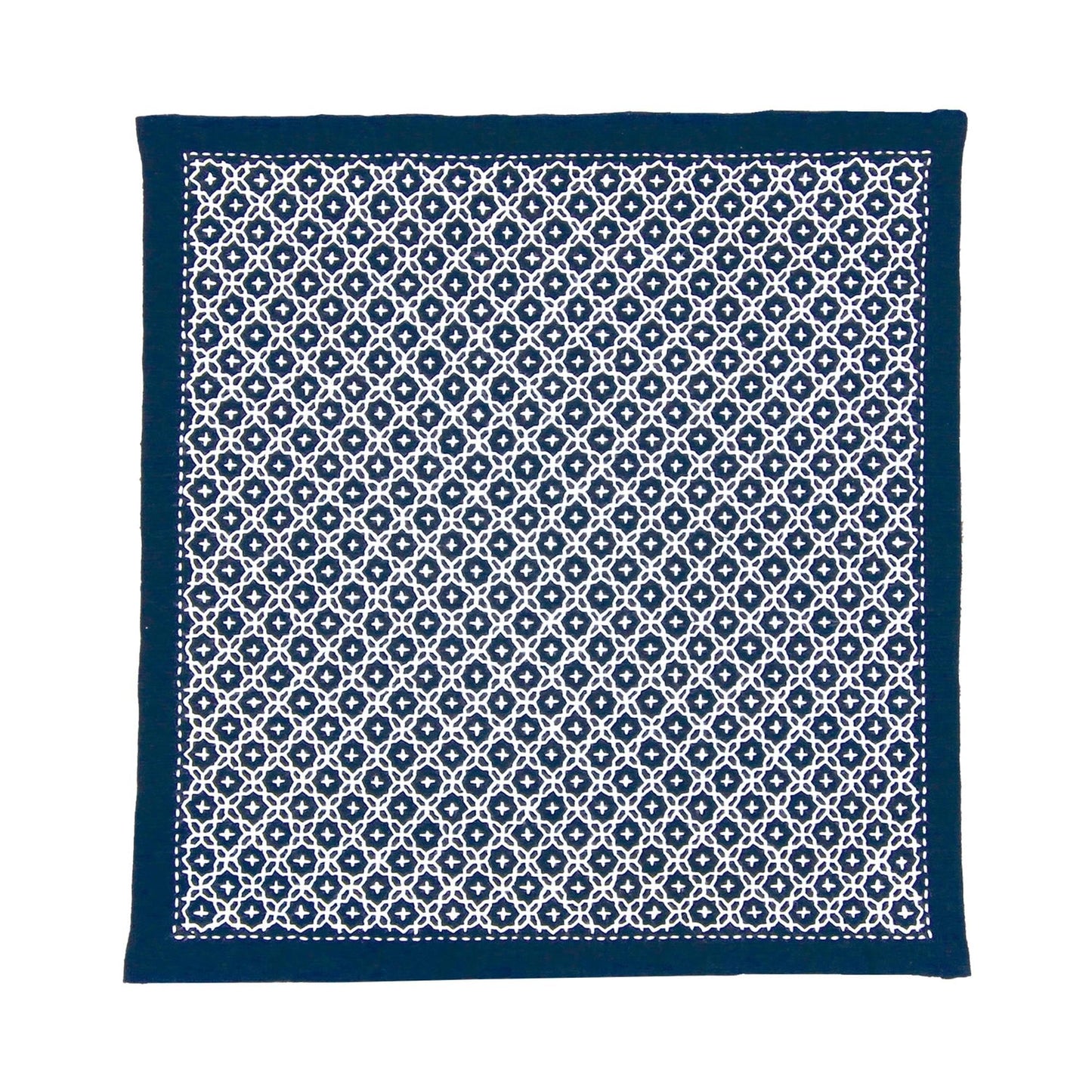 a square-shaped fabric with a repeating pattern of white and navy blue geometric shapes.