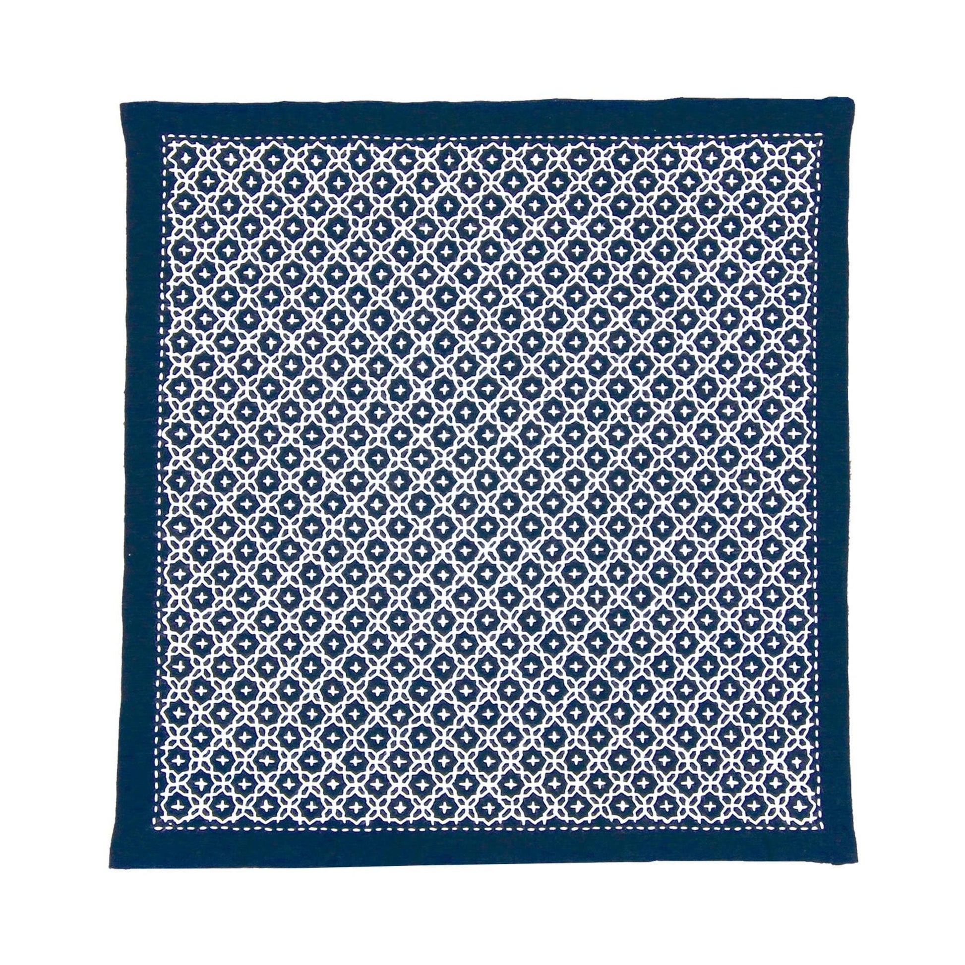 a square-shaped fabric with a repeating pattern of white and navy blue geometric shapes.