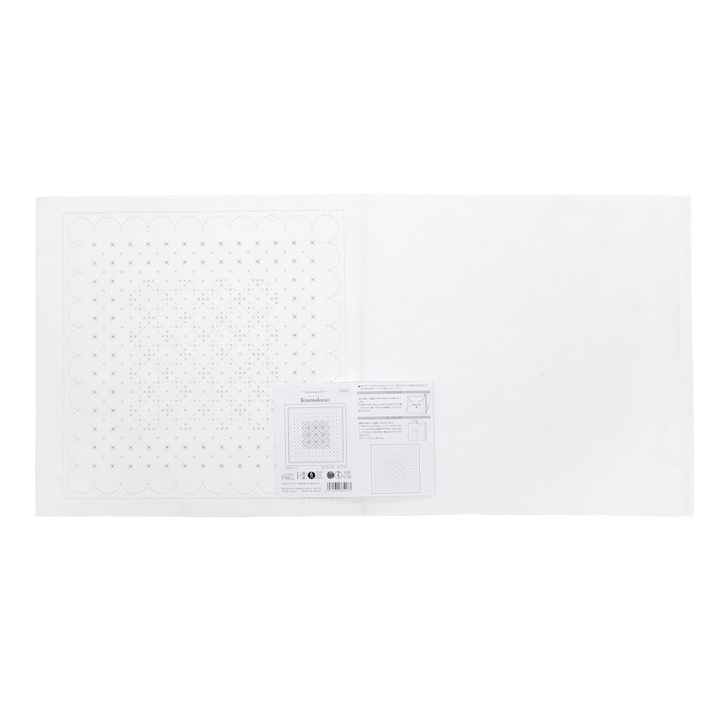 The image is a plain white sheet of paper with a grid pattern on it.