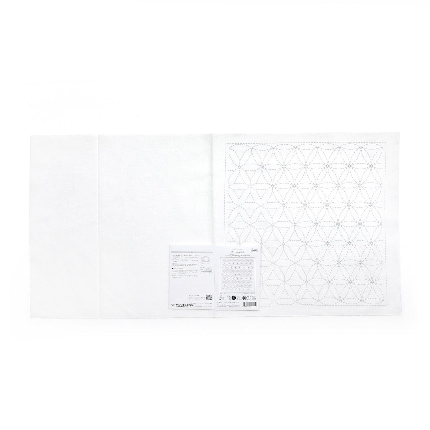The image is a white sheet of paper with a geometric pattern on it.